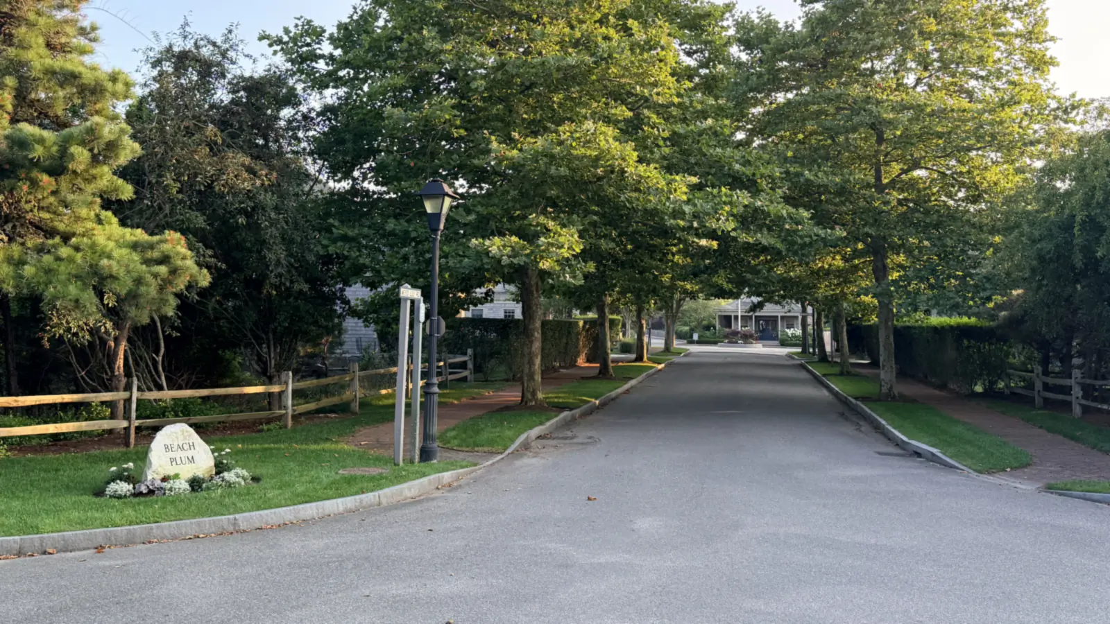 Entrance to Beach Plum Village, Nantucket, on a tree-lined lane