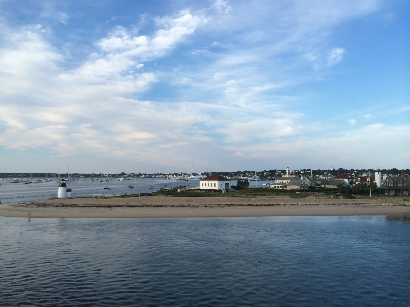 Brant Point Light and the Nantucket town waterfront seen from the harbor