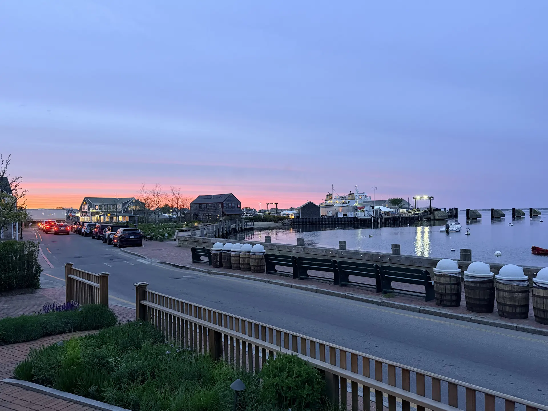 Evening light over calm harbor water, the daily view from Pocomo Nantucket real estate