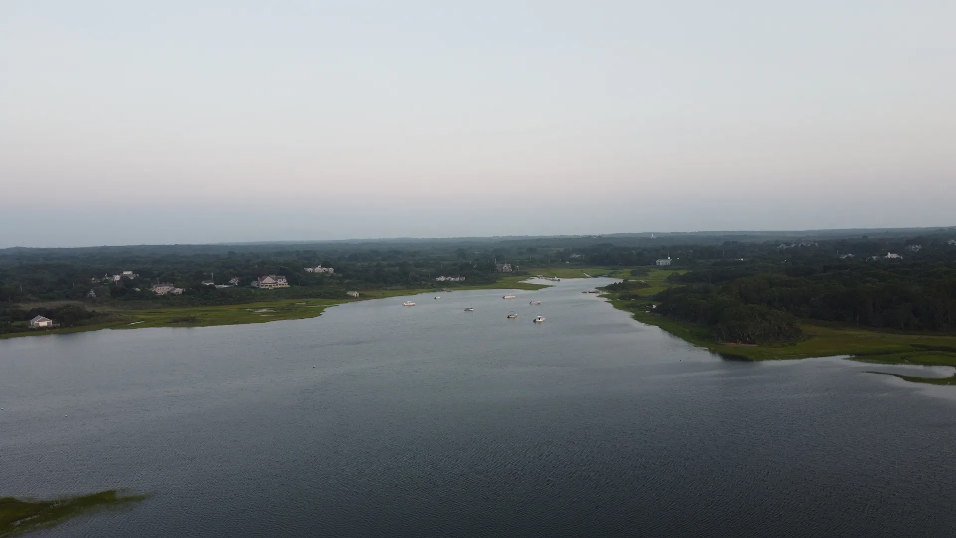Harbor inlet and marsh grass at dusk in Shawkemo, Nantucket